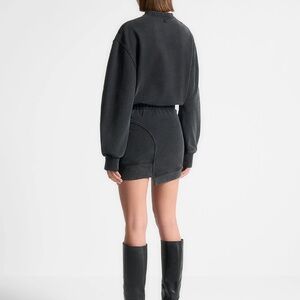 Black asymmetric hem jumper dress